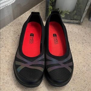 Shoes For Crews Women's Black Sneakers with Vibrant Red Interior